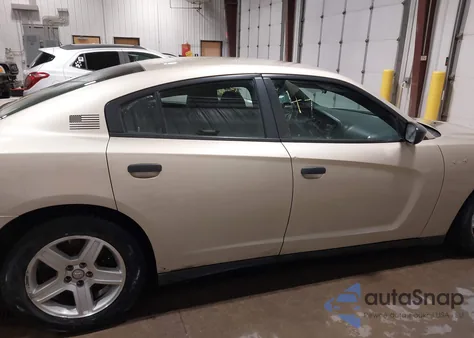 2013 Dodge Charger Police z USA, uszkodzony, nr VIN 2C3CDXAT3DH620107